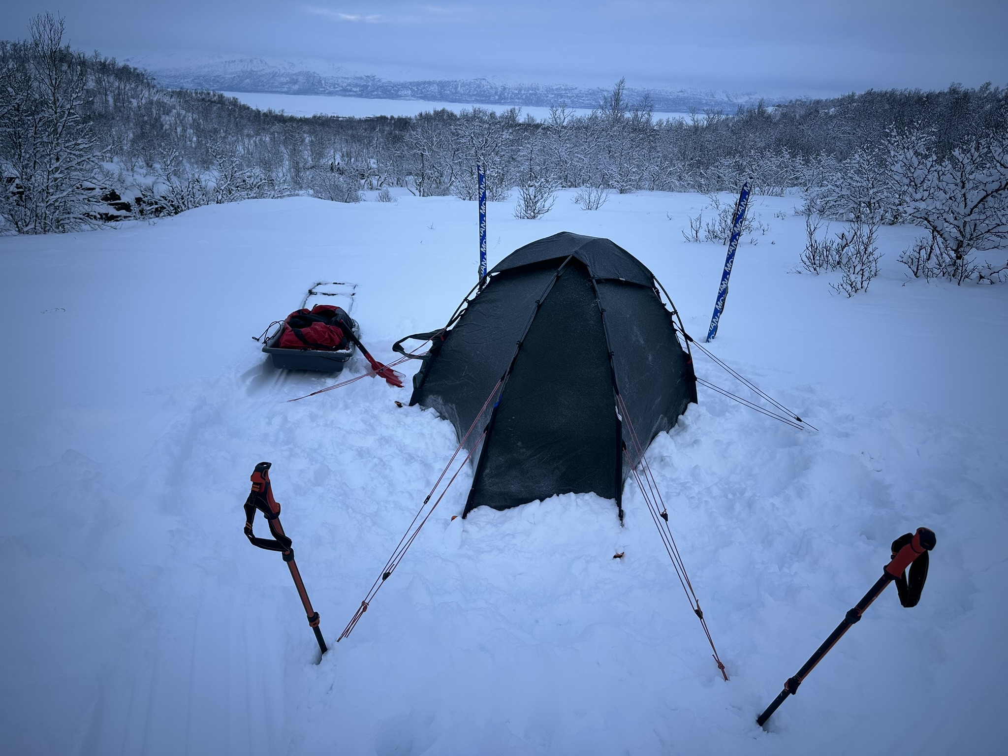 Putting the tent up in the snow