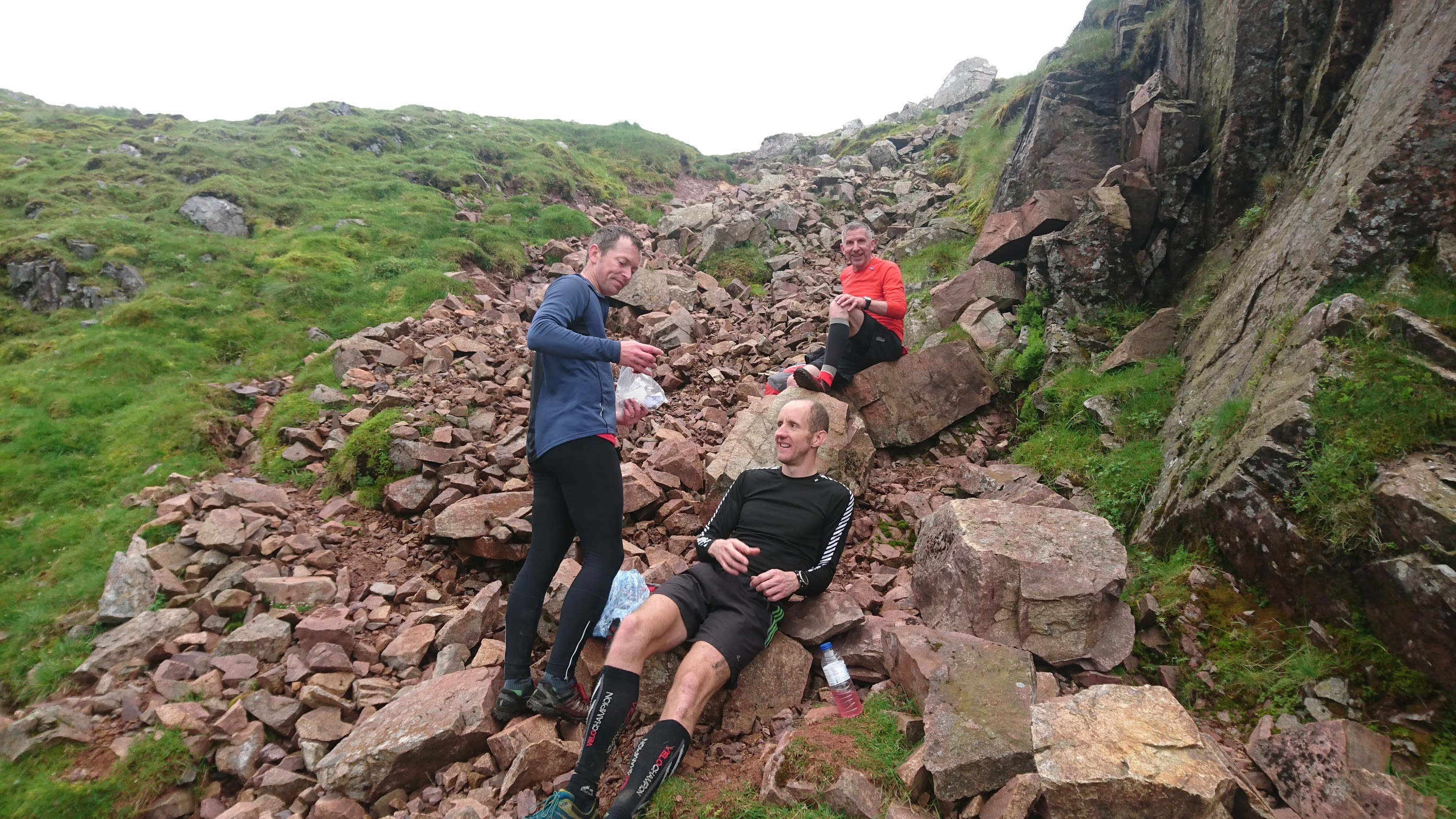 Enjoying a quick break on Kirk Fell climb