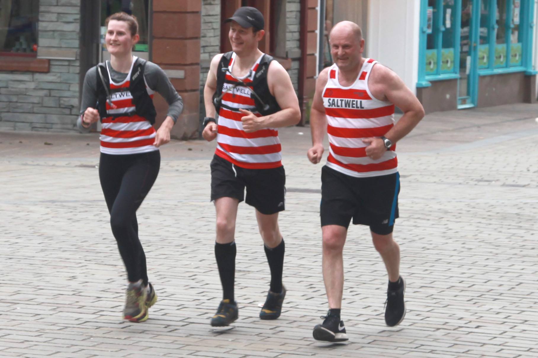 Catherine, Harra and Simon running in together